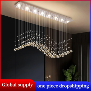 Modern linear crystal pendant chandelier over kitchen island