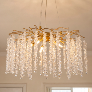 Gold tree branch raindrop crystal chandelier over kitchen island